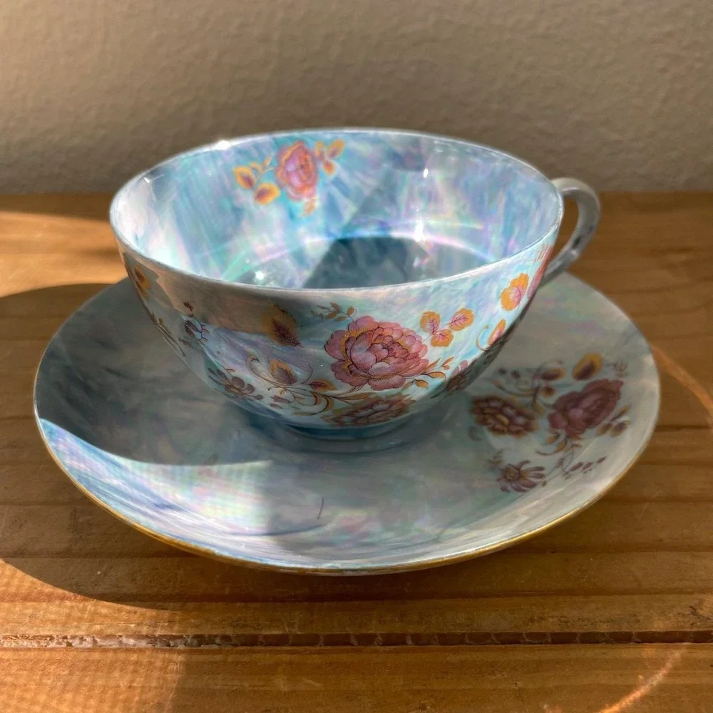 Vintage Blue Iridescent Teacup and Saucer Thomas Germany Lustreware Floral‎